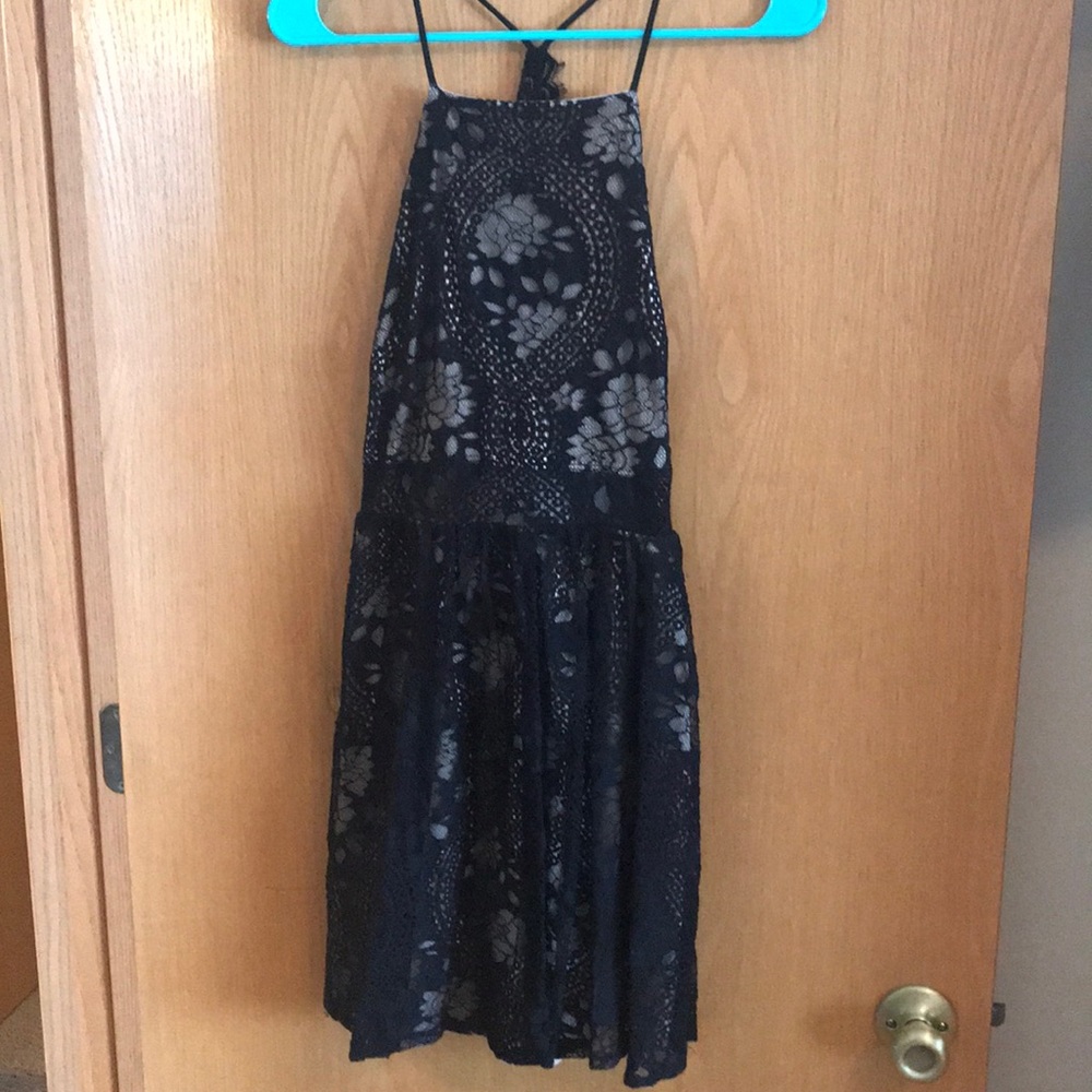 Francesca’s little black lace dress